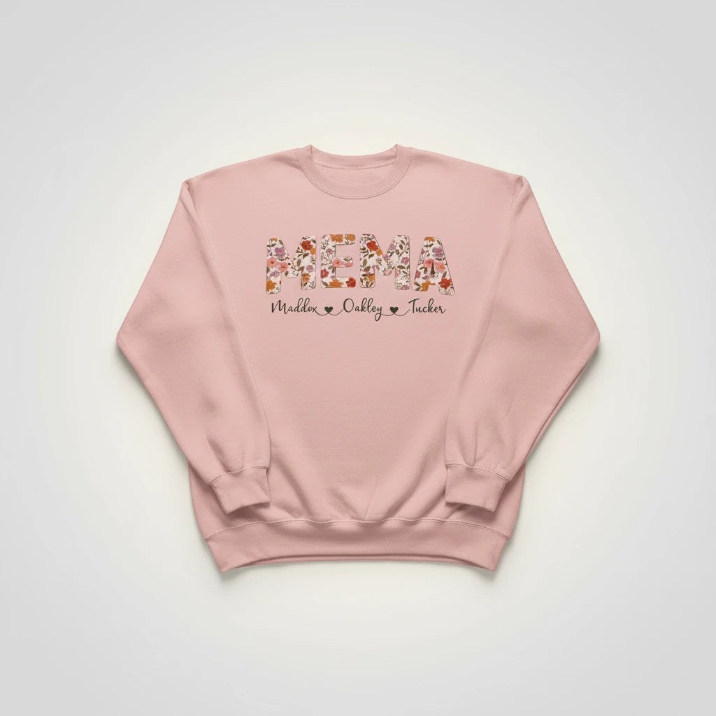 Sudadera rosa palo personalizada de Evy's Design con "MEMA" en letras florales y nombres de niños debajo.